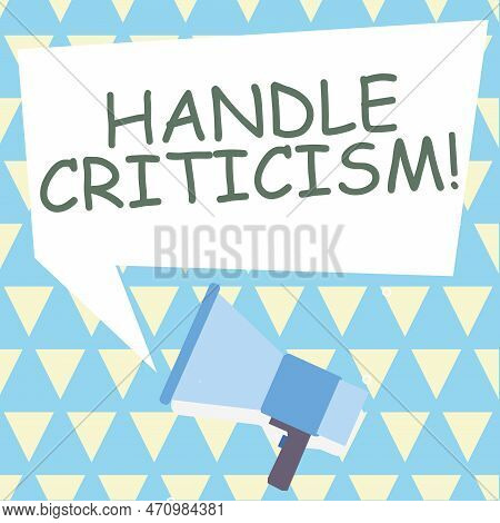 Hand Writing Sign Handle Criticism. Word Written On Process Of Withstanding Valid And Well Reasoned 