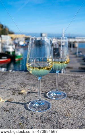 Tasting Of Txakoli Or Chacolí Slightly Sparkling Very Dry White Wine Produced In Spanish Basque Coun