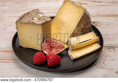 Pieces Of Cheese Tomme De Montagne Or Tomme De Savoie Made From Cow Milk In French Alps