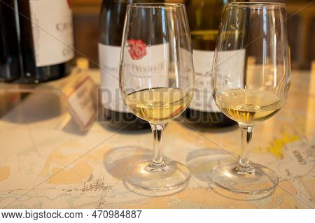 Tasting Of White Dry Chablis Wine In Small Winery In Chablis Town, Burgundy, France