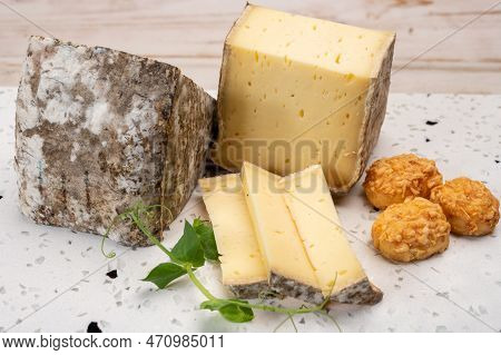 Pieces Of Cheese Tomme De Montagne Or Tomme De Savoie Made From Cow Milk In French Alps