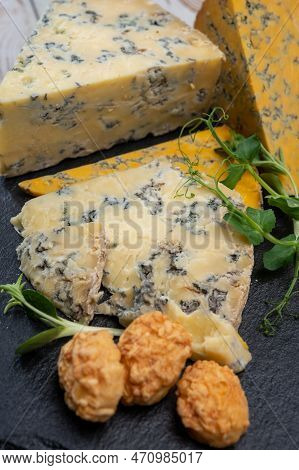Tasting Of English Cheeses Blue Stilton And Blue Shropshire Close Up