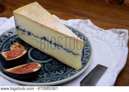 French Semi-soft Cow Milk Cheese Morbier From Franche-comte Region With Thin Black Layer And Strong