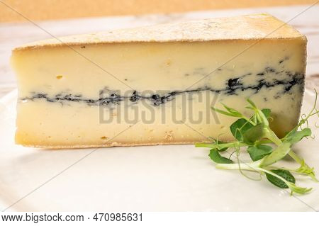 French Semi-soft Cow Milk Cheese Morbier From Franche-comte Region With Thin Black Layer And Strong