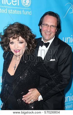 Joan Collins and Percy Gibson at the 2011 Unicef Ball, Beverly Wilshire Hotel, Beverly Hills, CA 12-08-11