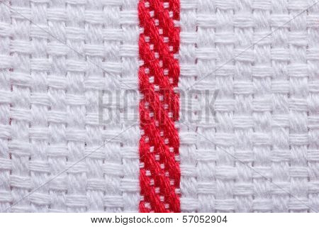 Texture Of White Cotton Kitchen Towel With A Red Stripe. Macro.
