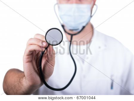 Doctor holding stethoscope