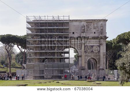 Tourists Visiting The Triumphal Arch Of Titus (81 Ad)