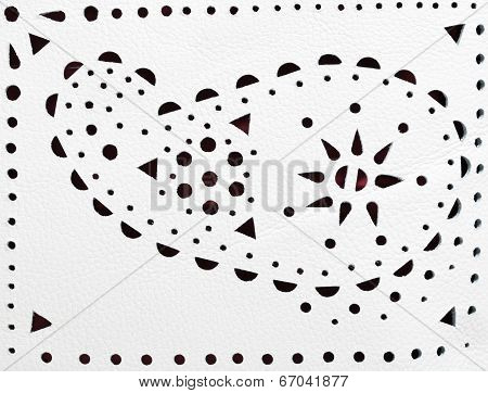 Perforated Paisley Ornament On White Leather