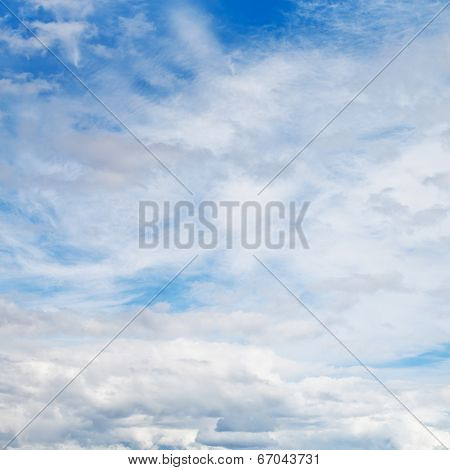 Cirrus And Cumuli White Clouds In Blue Sky