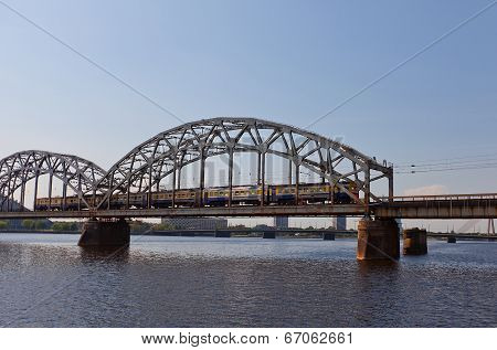 Train On The Bridge Over Daugava River. Riga, Latvia
