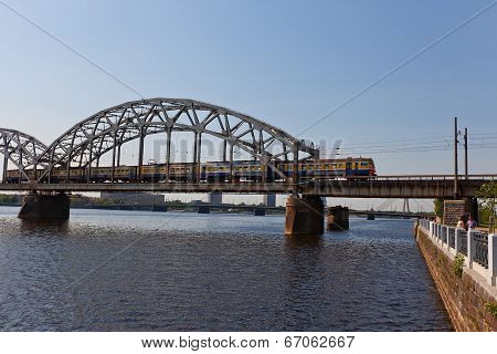Train On The Bridge Over Daugava River. Riga, Latvia