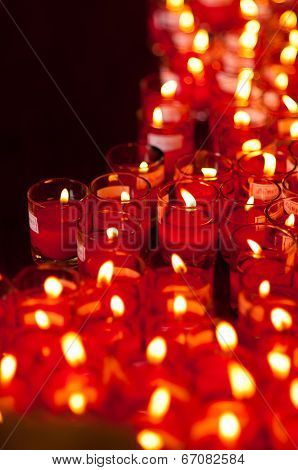Church Candles In Red Transparent Chandeliers