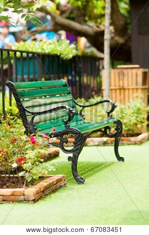 Antique Chair In A Green Garden