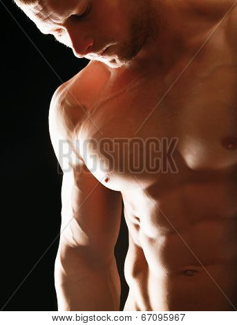 Healthy muscular young man.