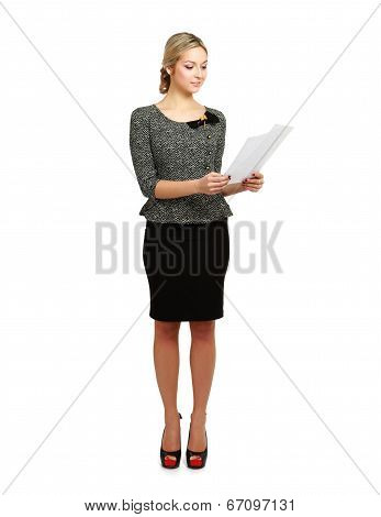 Portrait of a happy business woman holding papers