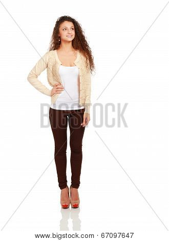 young woman standing in full length isolated on white background .