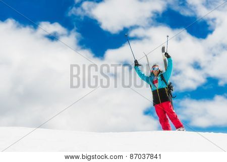 Girl Freeride Skier, Raises His Hands Before The Descent From The Top