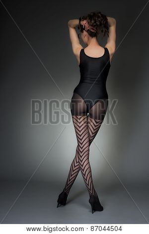 Stylish Rear Shot Of Woman In Fashion Tights