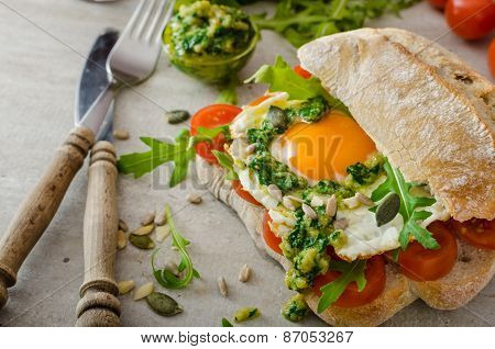 Ciabatta With Fried Egg, Tomatoes And Pesto