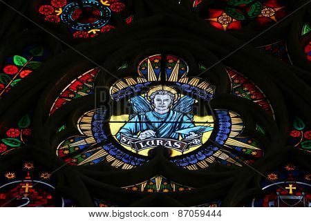 VIENNA, AUSTRIA - OCTOBER 10: Saint Luke the Evangelist, Stained glass in Votiv Kirche (The Votive Church). It is a neo-Gothic church located on the Ringstrabe in Vienna, Austria on October 10, 2014