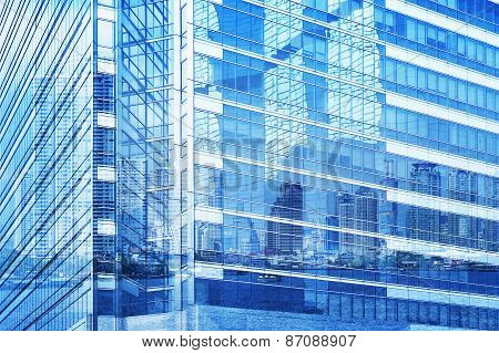 Reflection Of City Tower On Modern Window Buildind