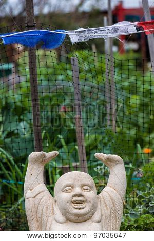 Buddha With Arms Over Head Smiling