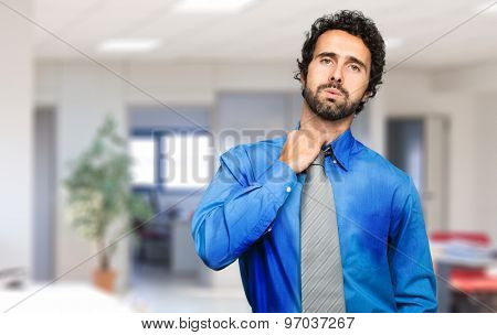  Sweating businessman due to hot climate