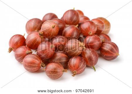 Heap of red gooseberry isolated on white