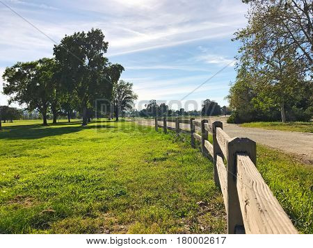 green golf field and blue cloudy sky. american landscape.