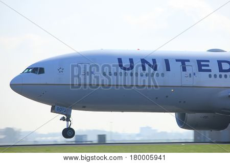 Amsterdam the Netherlands - April 2nd 2017: N77012 United Airlines Boeing 777-200 takeoff from Polderbaan runway Amsterdam Airport Schiphol