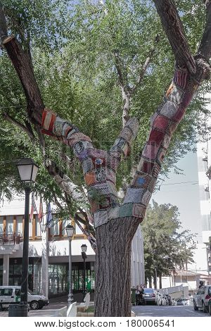 tree decorated with crochet work at main square of Petrer in the province of alicante spain
