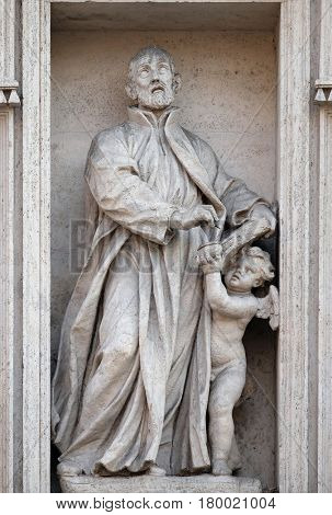 ROME, ITALY - SEPTEMBER 01: Saint Cajetan statue on the portal of Sant Andrea della Valle Church in Rome, Italy on September 01, 2016.