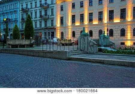 Golem Monument And Kronthal Fountain On Marcinkowski Avenue Evening Poznan