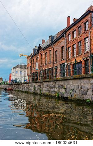 Buildings On Graslei And Korenlei Over Lys River In Ghent