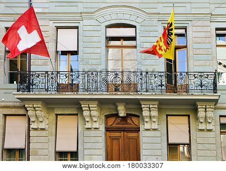 Flags On Building On Rue Puits Saint Pierre Geneva