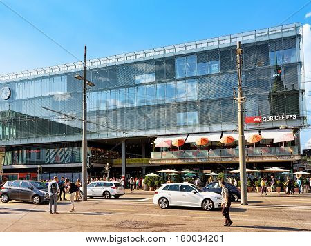 People At Train Station Building On Bahnhofplatz In Bern