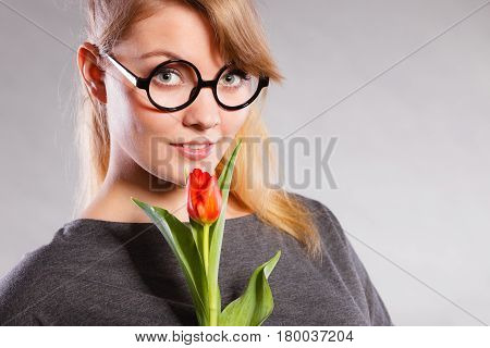 Beauty Woman With Tulip Flower.