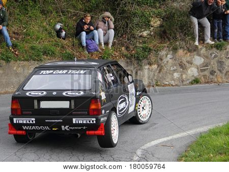 Testico Italy - April 01 2017-64 Di Sanremo Rally: The Lancia Delta Integrale conducted by the crew Lucky-Pons during the second special stage of speed 'timed race, one that led to the summit from Testico' del Colle D'Oggia.