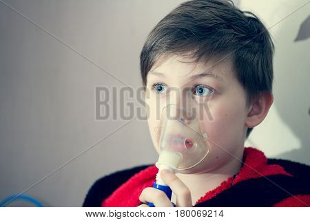 Child With Inhalation Mask
