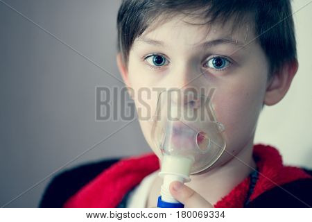 Child With Inhalation Mask