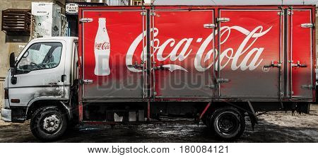 Kazakhstan, Ust-kamenogorsk, march 14, 2017: Coca-Cola truck, side view, red truck
