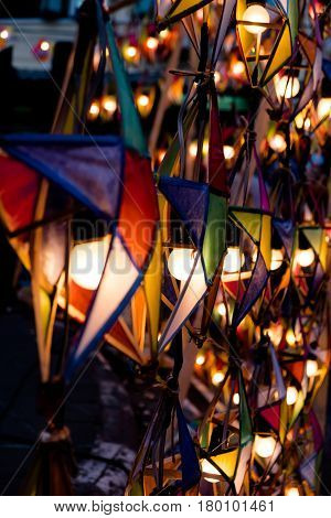 Multi colored star lamps and background .
