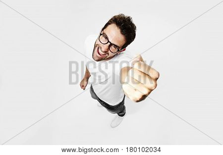 Happy Punching air dude in white studio