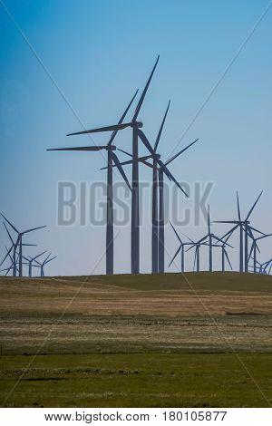 Wind Turbines Creating Clean Energy in open field