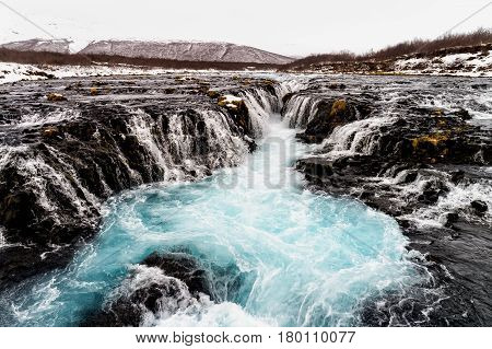 Aerial View Of Beautiful Bruarfoss Waterfall With Turquoise Water, South Iceland