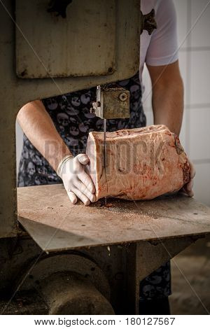 Butcher Is Slicing Meat