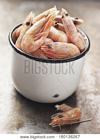 close up of rustic english pub grub pint of prawns