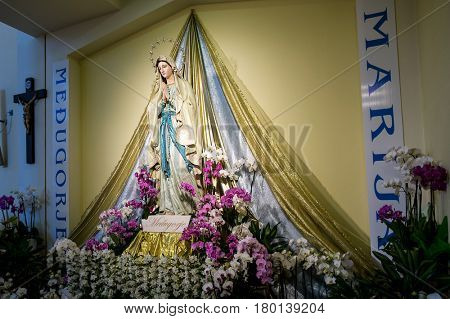 Medjugorje, Bosnia and Herzegovina - June 17, 2012: Inside Saint James church, statue of Holy Mary - Our Lady of Medjugorje, this is the place where it is believed that Blessed Virgin Marry appeared.