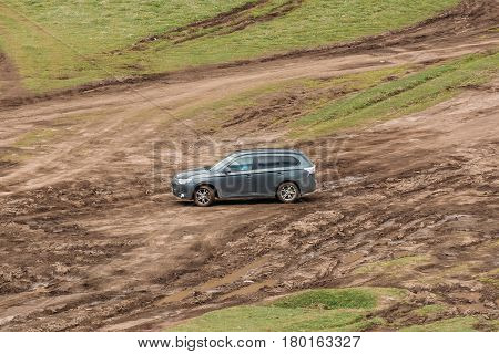 Stepantsminda Gergeti, Georgia - May 23, 2016: Mitsubishi Outlander XL on diirty road. Mitsubishi Pajero Sport is a mid-size crossover produced by the Japanese manufacturer Mitsubishi Motors